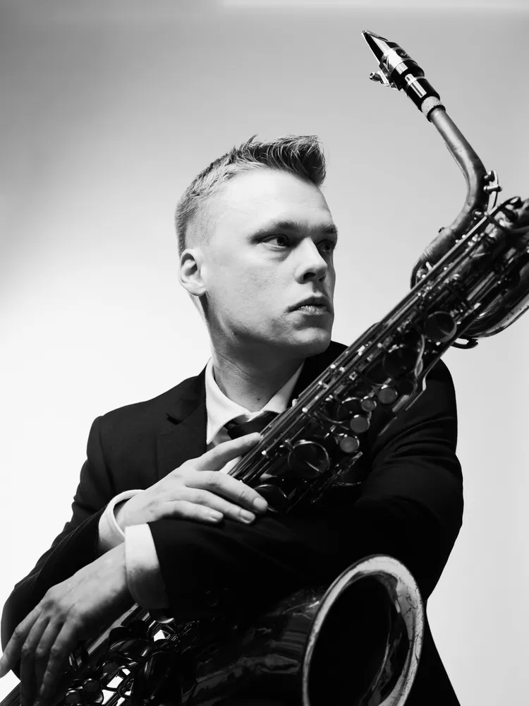 Justin Brown with saxophone